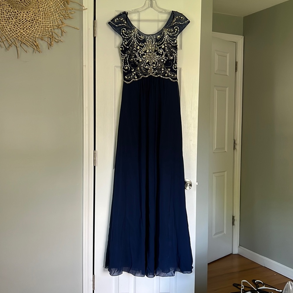 Blue flowy chiffon prom dress with rhinestones